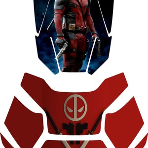 May include: Red and black graphic featuring the character Deadpool. The design includes a full-body image of Deadpool, along with his logo, crossed swords, and two pistols. The overall theme is comic book and superhero.