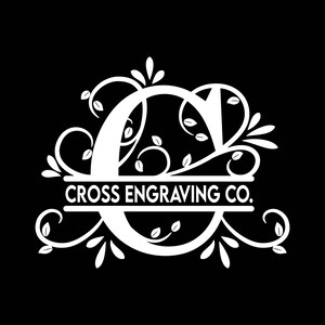 May include: White silhouette of the letter "C" with decorative floral vines and leaves. The text "CROSS ENGRAVING CO." is centred above the letter.