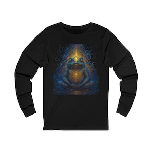 May include: Black long-sleeve shirt featuring a detailed illustration of a meditating frog with a third eye. The frog is depicted in shades of blue and gold, with intricate patterns and a glowing aura.