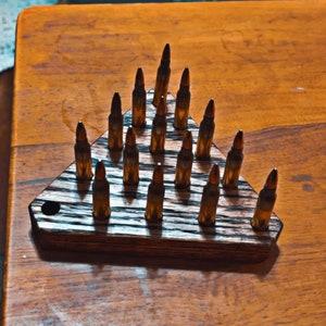 Juego de solitario Peg versión de 5,56 mm