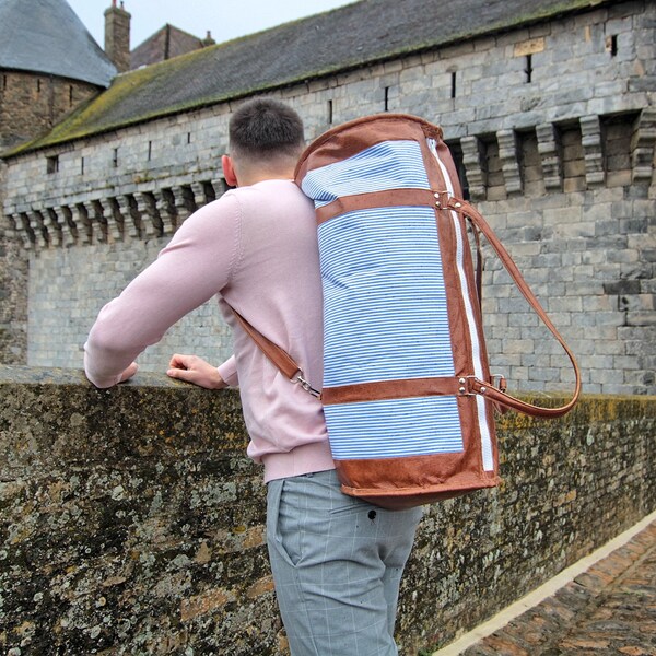 Sac de voyage en cuir et toile marine pour homme portable sur le dos