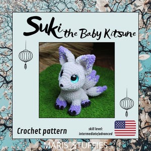 May include: Crochet pattern for a white and purple baby kitsune, a Japanese mythical fox, with blue eyes. The pattern is labeled "Suki the Baby Kitsune" and is for an intermediate to advanced skill level. The pattern is available for purchase on Etsy.