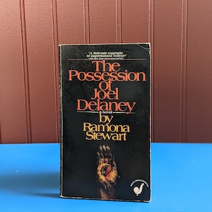 Het bezit van Joel Delaney door Ramona Stewart — Vintage kriel paperback