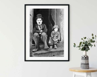 Photo Affiche noir et blanc de Charlie Chaplin dans le film "Le Kid" en 1921 - tirage sur papier photo lustré 260g/m2