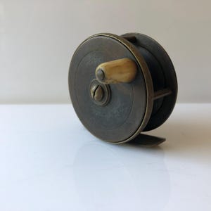 2 1/2&quot; Brass Plate Wind Antique Fishing Reel