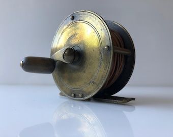 ancien petit moulinet péche à la mouche diamètre 4cms alu