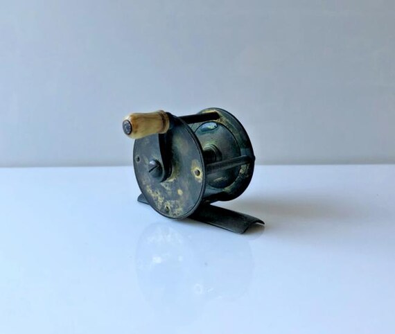 antique and classic fishing reels 19th Century Antique Brass Crank Wind 1 3/4 inch Fishing Reel