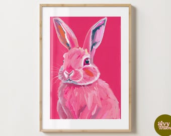 Könnte beinhalten: Ein rosa Kaninchen mit langen Ohren und einem flauschigen Schwanz ist vor einem leuchtend rosa Hintergrund gemalt. Die Augen des Kaninchens sind schwarz und seine Nase ist rosa. Das Gemälde ist in einem lockeren, expressiven Stil gehalten.