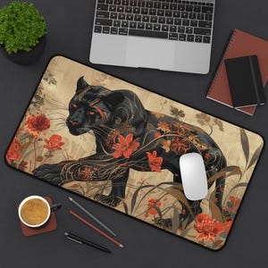 May include: Black panther with intricate gold and red floral tattoos on a beige background. The panther is walking through a field of red flowers. This is a design for a mousepad.