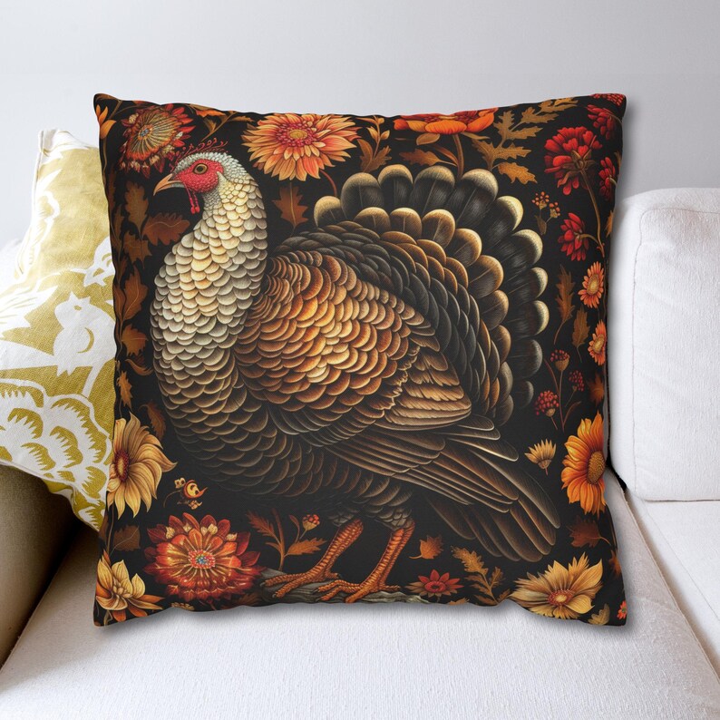 May include: A throw pillow with a dark background featuring a detailed illustration of a brown and white turkey with a red wattle. The turkey is surrounded by colorful flowers and leaves.