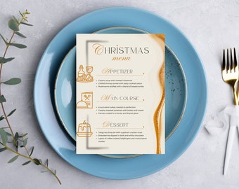 May include: A Christmas menu card with a gold and white marble design. The menu includes appetizers, main course, and dessert options. The text reads "Christmas menu", "Appetizer", "Main Course", and "Dessert".