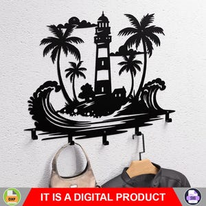 May include: Black metal wall-mounted key holder featuring a coastal scene with a lighthouse, palm trees, and waves. Includes four hooks for hanging items. The text "IT IS A DIGITAL PRODUCT" is at the bottom.
