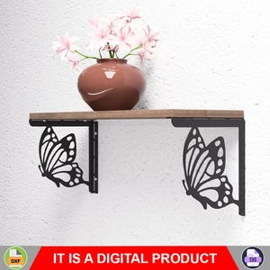 May include: A wooden shelf supported by two black metal brackets with butterfly cutouts. A brown vase with pink flowers sits on the shelf. The text "IT IS A DIGITAL PRODUCT" is displayed at the bottom.