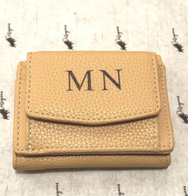 This Personalized Leather Mini Wallet is designed for women who adore both beauty and practicality. Ideal for birthdays, Christmas, or thank-you gifts. Cute, compact, and custom—she’ll carry it everywhere!
#WomensWallets #CompactEssentials #GiftForHer2025 #CustomAccessories #CoinPouchLove #PersonalizedStyle #LeatherCharm #UniqueGifts
