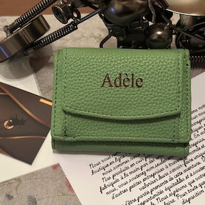 Small in size, big on charm. This custom leather mini wallet is perfect for holding coins, cards, and keys. A thoughtful personalized gift for women—ideal for birthdays, holidays, or thank-you surprises.
#CuteWallet #PersonalizedForHer #GiftGuide2025 #CustomCoinPurse #WomensStyle #LeatherAccessories #ChristmasGifts #GiftIdeasForHer