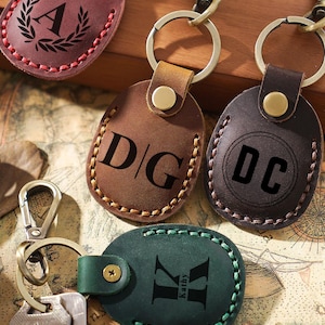 Llavero de piel de vaca personalizado: funda para AirTag cosida a mano con llavero, funda de cuero genuino para llavero y funda protectora para AirTag.