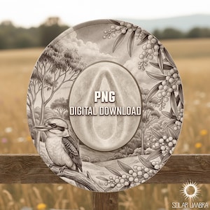 May include: A digitally illustrated, grayscale image of a hat with a detailed design. The hat features a kookaburra bird perched on a branch, surrounded by foliage and berries. The text "PNG DIGITAL DOWNLOAD" is centered on the hat.