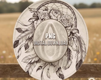 May include: A cream-coloured fedora hat featuring a dreamcatcher design with floral and feather accents. The hat has the text "PNG DIGITAL DOWNLOAD" printed on the crown. The hat is displayed on a wooden fence.