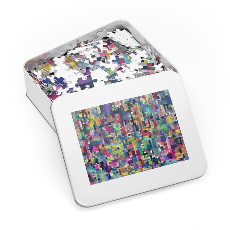 White metal tin box with finished image of impossible puzzle on the cover