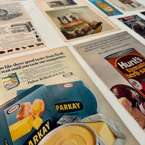 May include: A vintage advertisement for Kraft Parkay margarine. The ad features a blue and white container of Parkay margarine with the text "Soft Parkay" and "Margarine" printed on it. The ad also features a bowl of yellow margarine and a slice of butter.