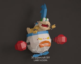 Op de afbeelding: Een 3D papieren knutsel-DIY van Larry Koopa, een personage uit de Mario-videogameserie. De figuur staat in een boksstand, met rode bokshandschoenen en een blauw-witte container. De figuur heeft een geel en groen lichaam met blauw haar.