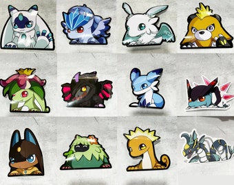 May include: A set of twelve cartoon creature stickers in various colours. The stickers depict different designs, such as a white and blue creature, a blue and white winged creature, and a yellow and brown bear-like character. Each sticker has a glossy finish and a black outline.