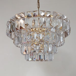 A vintage 1970s cut & polished cristal chandelier