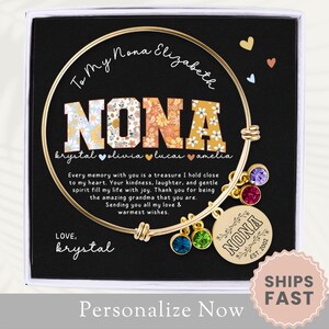 May include: A gold bangle bracelet with a charm that says "NONA" and a floral design. The bracelet is in a black box with a message that says "To My Nona Elizabeth" and "Every memory with you is a treasure I hold close to my heart. Your kindness, laughter, and gentle spirit fill my life with joy. Thank you for being the amazing grandma that you are. Sending you all my love & warmest wishes. Love, krystal".