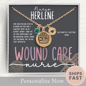 May include: A gold necklace with a charm that says "It's a beautiful day to heal wounds" and a blue and gold charm. The necklace is in a gray box with a message that says "Nurse Herlene, your dedication and expertise in wound care have made a significant impact on my recovery journey. Thank you for your compassionate care and unwavering support during this challenging time. You are truly appreciated. With heartfelt gratitude, Sophir." The box also has the words "Wound Care Nurse" in pink and purple letters.