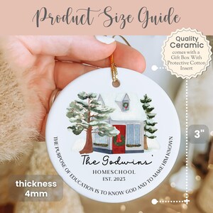 May include: White ceramic Christmas ornament with a winter scene of a house with a red door and snow-covered trees. The ornament is 3 inches in diameter and 4 mm thick. The text on the ornament reads "The Godwins Homeschool Est. 2023" and "The purpose of education is to know God and to make Him known."