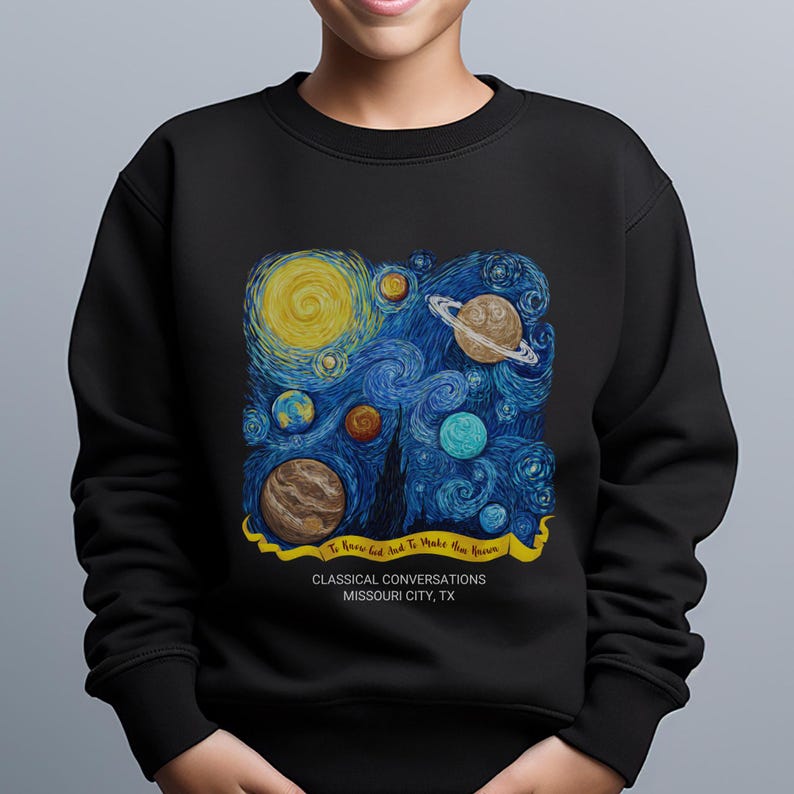 May include: A black crewneck sweatshirt featuring a graphic print of a swirling starry night sky with various planets. A yellow banner contains the text To Know God And To Make Him Known, with Classical Conversations Missouri City, TX below.