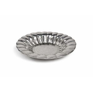 May include: A silver-colored, scalloped-edge dish. The dish has a shallow, circular center and a series of curved ridges that form the outer rim. The metal surface reflects light, creating highlights and shadows.