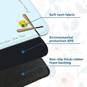 May include: A light blue mousepad with a baseball and bats graphic. The mousepad features a soft tech fabric, environmental protection XPE, and a non-slip thick rubber foam backing. The text "Dragons crack" and "green dragon Dots-Soaps" are visible.