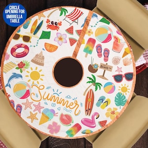 May include: White round tablecloth with a brown wooden border. The tablecloth features a summer theme with various colorful illustrations of beach items, including palm trees, flip flops, ice cream cones, watermelons, and a surfboard. The text "Summer" is written in a whimsical font in the center of the tablecloth. There is a circle opening in the center of the tablecloth for an umbrella table.