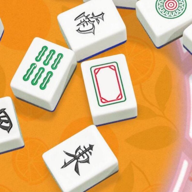 May include: A collection of white Mahjong tiles with various symbols and markings in green, red, and black. The tiles are scattered on an orange background, showcasing the game's diverse designs and colors.