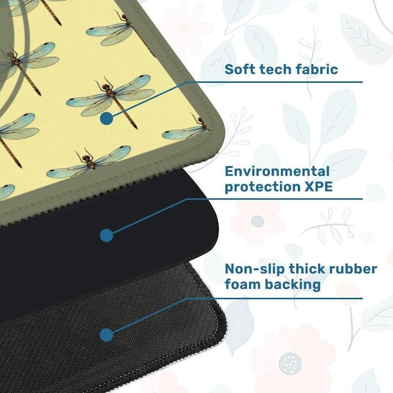 May include: A mousepad with a light yellow surface featuring a pattern of blue dragonflies. The mousepad has a gray border, a black middle layer, and a textured black bottom layer. The text "Soft tech fabric", "Environmental protection XPE", and "Non-slip thick rubber foam backing" are visible.