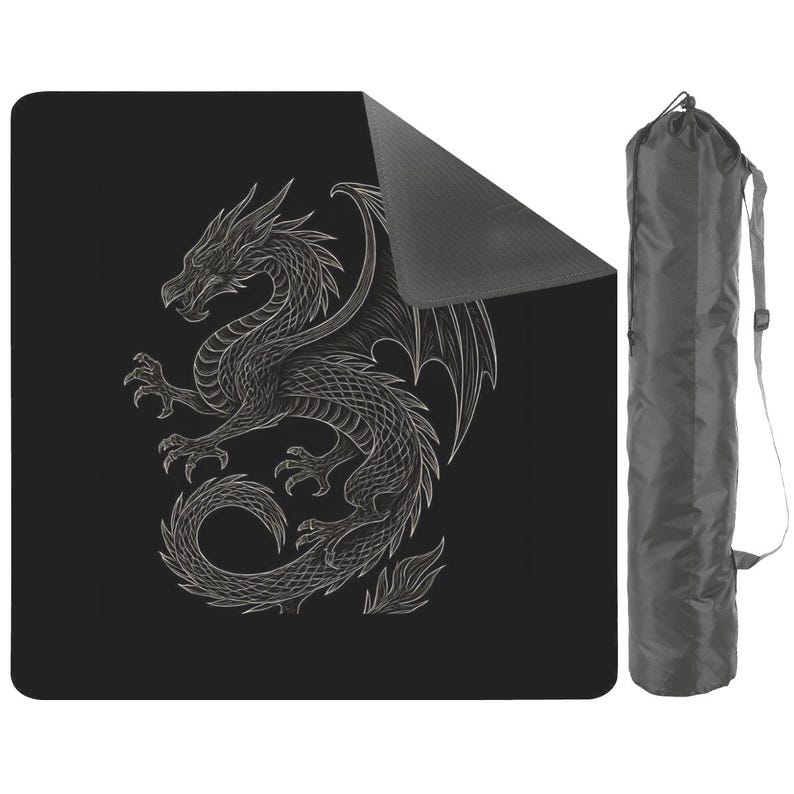 May include: Black yoga mat featuring a detailed white dragon illustration. The dragon is depicted with intricate scales, wings, and claws. A matching gray carrying bag with a shoulder strap is included, providing convenient storage and transport for the mat.