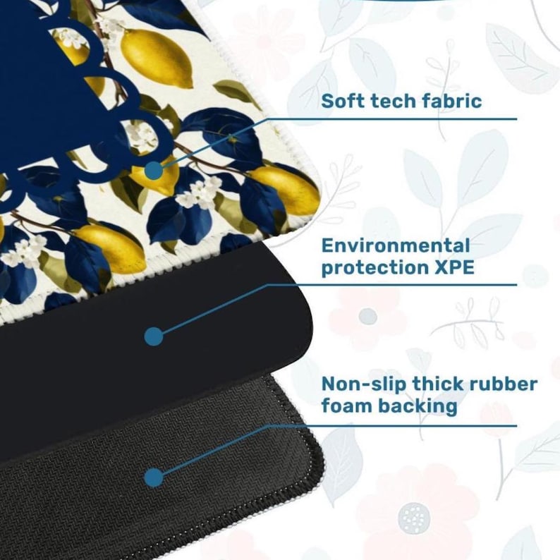 May include: A close-up of a mousepad with a lemon and blue leaf design. The mousepad has a soft tech fabric, environmental protection XPE, and a non-slip thick rubber foam backing.