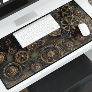 May include: A rectangular mouse mat with a steampunk design of bronze and brass gears on a dark background. A white keyboard and mouse are on the mat, resting on a white desk.