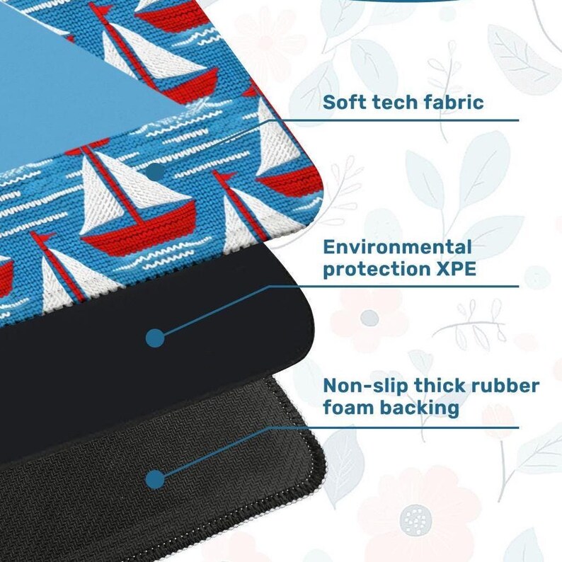 May include: A layered product with a blue top layer featuring red and white sailboats. The middle layer is black, and the bottom layer is a textured black. Text indicates "Soft tech fabric", "Environmental protection XPE", and "Non-slip thick rubber foam backing".