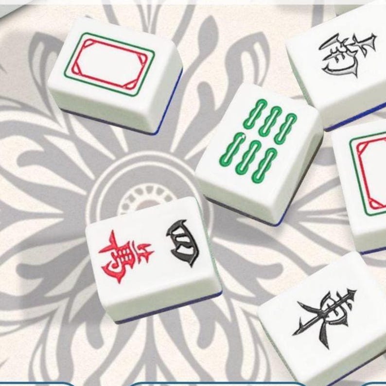 May include: White Mahjong tiles with green, red, and black symbols and markings. The tiles are arranged on a patterned background. Some tiles have rows of green markings, while others feature Chinese characters.