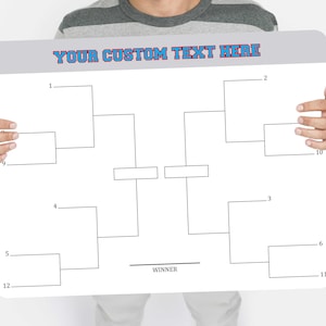 May include: A white board with a bracket style tournament chart. The chart has 12 slots for names or teams. The chart has the text "YOUR CUSTOM TEXT HERE" at the top.