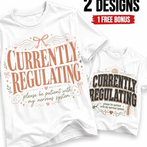 May include: Two white t-shirts featuring graphic designs. The larger shirt displays the text "CURRENTLY REGULATING" in orange with "please be patient with my nervous system" below. The smaller shirt features the same text in black with anatomical icons.