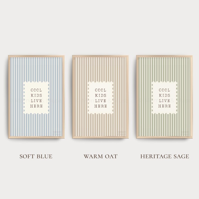 May include: Three framed prints with vertical striped backgrounds in soft blue, warm oat, and heritage sage colors. Each print has a white rectangle with the text "COOL KIDS LIVE HERE".