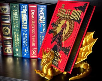 Exhibidor de libros con forma de dragón lector, soporte de fantasía para libros, Kindle o tableta. Más de 50 colores disponibles.