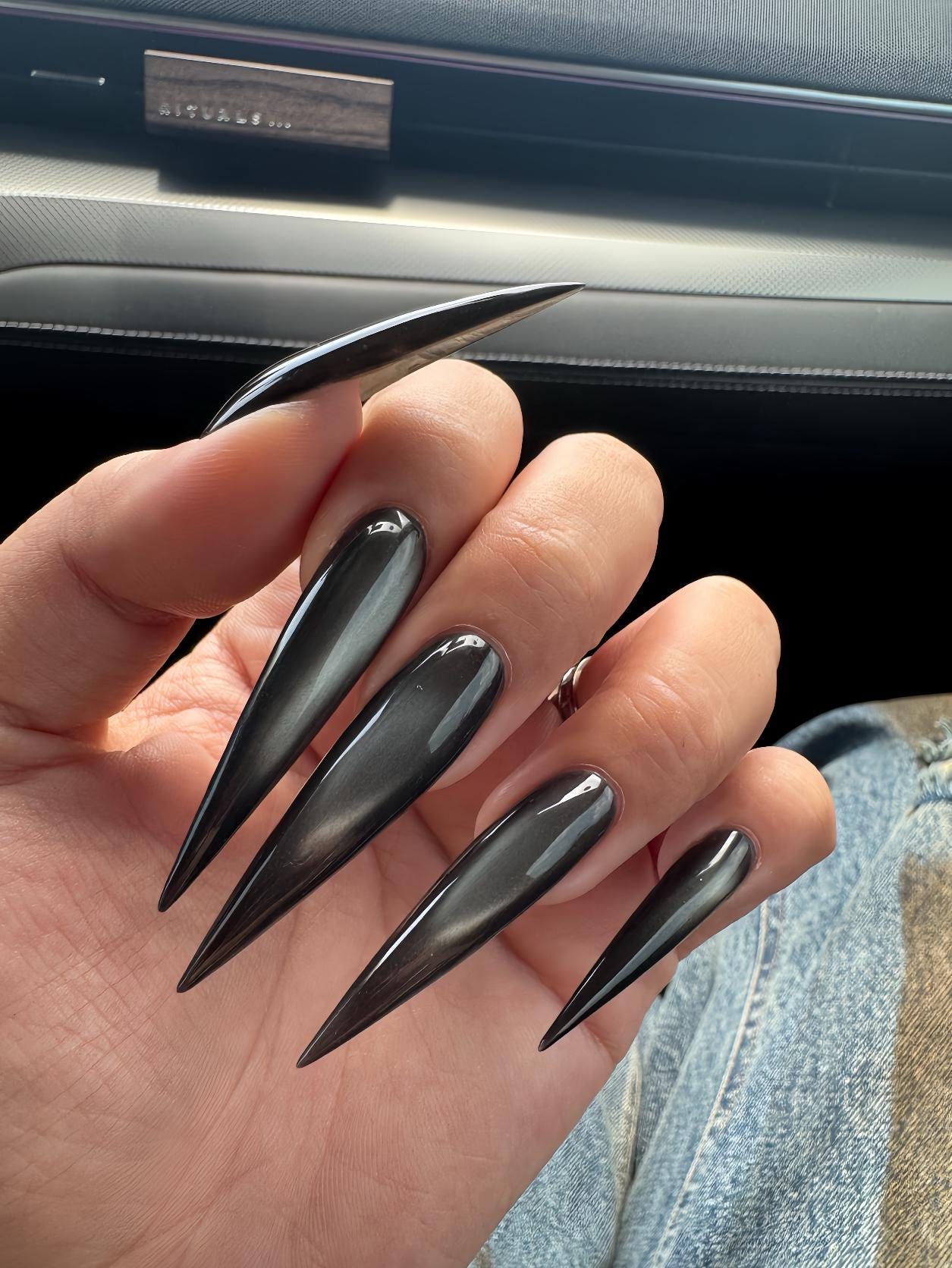 Embrace the Edgy Black Long Nail Trend