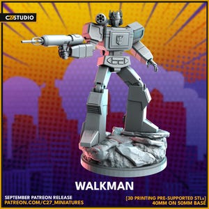 May include: A gray, 3D-printed Walkman robot figure, standing on a rocky base. The figure is holding a large gun and has a detailed design. The image includes the text "WALKMAN" and "SEPTEMBER PATREON RELEASE". The base is 40mm on a 50mm base.