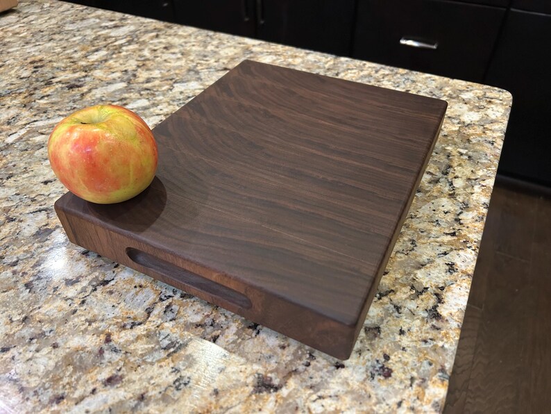 Black walnut end grain cutting board. (Or similar small wood cutting board)
