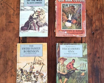 Vintage hardcover book collection classic books Huckleberry Finn book Swiss family Robinson Call of the wild story Old man Coyote books