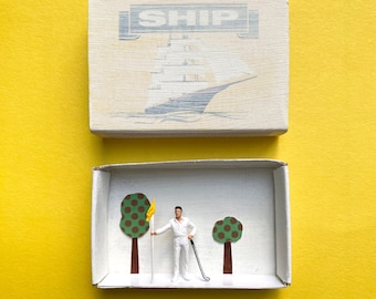 Miniature matchbox art. Hand painted and perfect for a golf lover. Great retirement present!